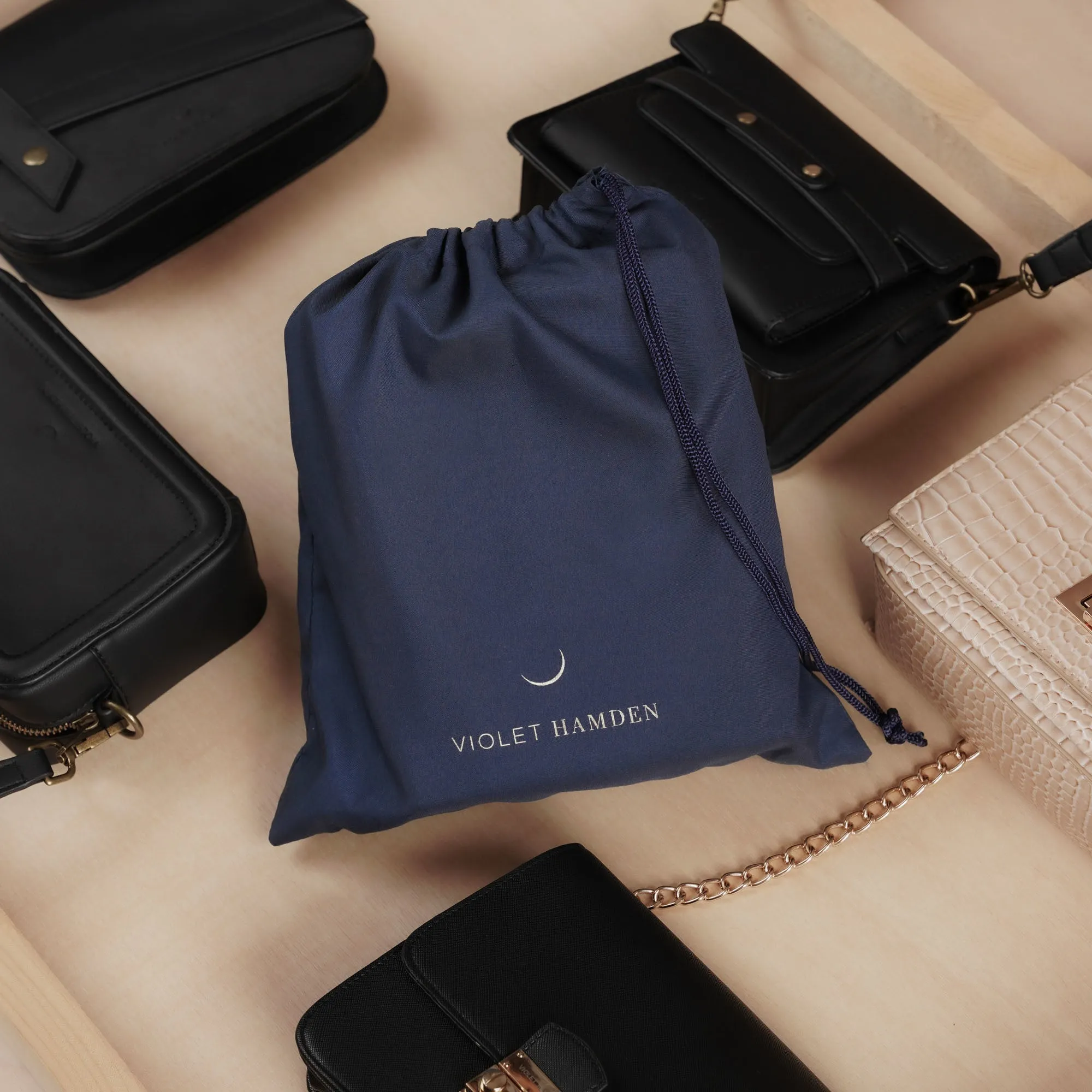 Essential Bag cream crossbody bag