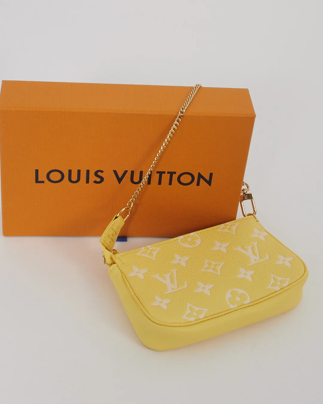 Louis Vuitton Yellow Monogram Empreinte Mini Pochette Accessoire