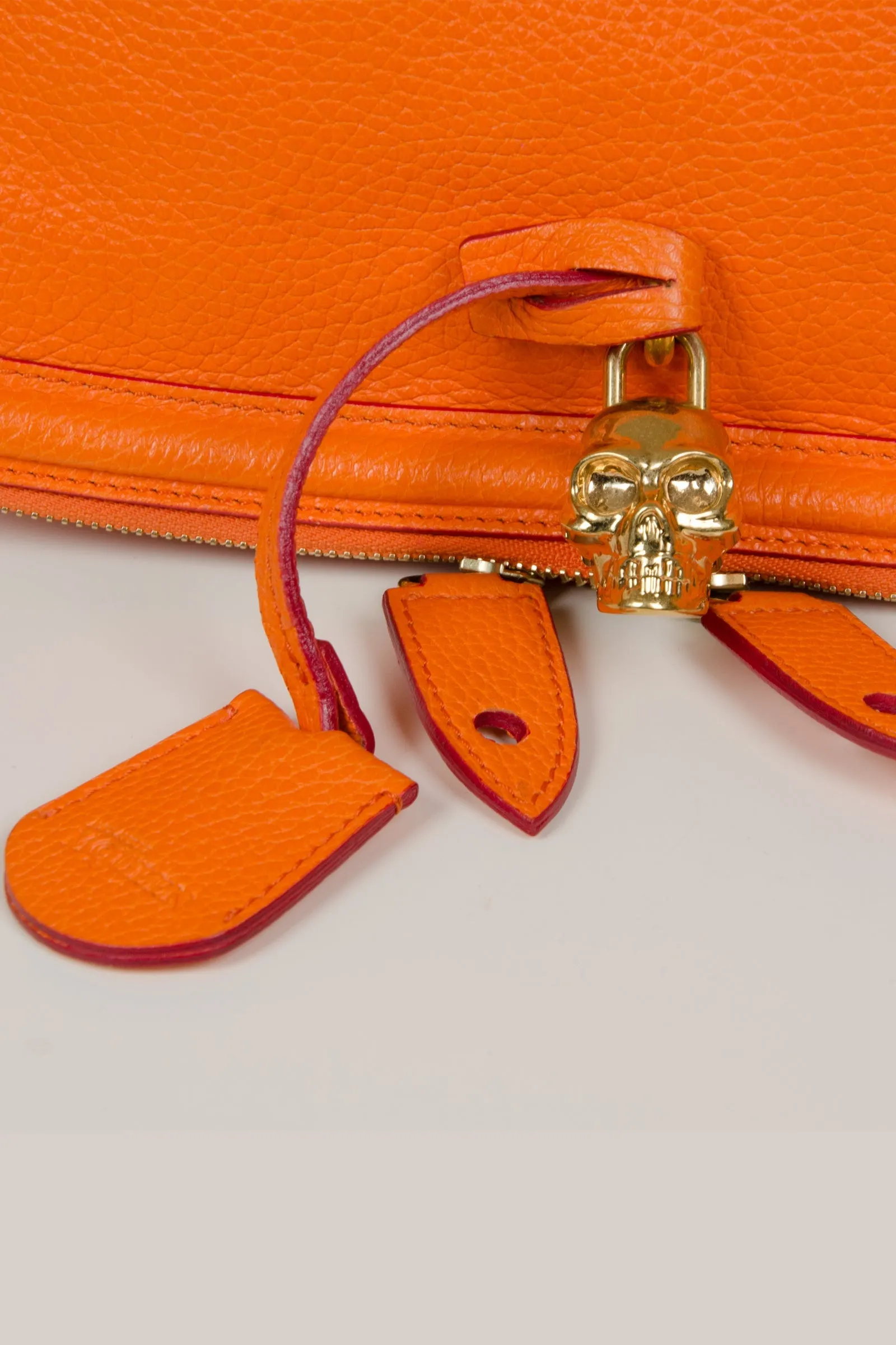 Orange Fold Over Skull Clutch